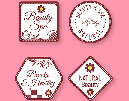 Set of four spa branding badges on a pink background, reading 'Beauty Spa', 'BEAUTY & SPA NATURAL', 'Beauty & Healthy', and 'NATURAL Beauty'.